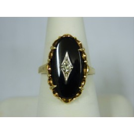 R404 ~ 10k Black Onyx & Diamond Ring